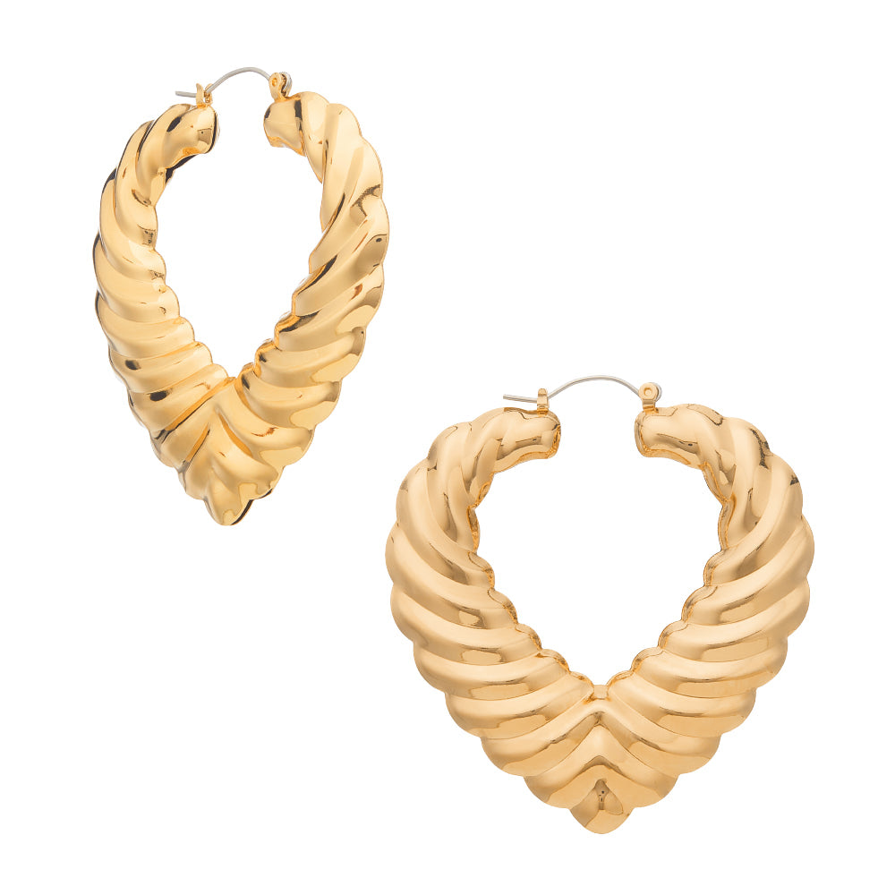 JE338_main "A pair of gold-tone heart-shaped earrings. The earrings have a textured, wavy design that gives them a unique and stylish appearance. They are displayed on a white card labeled "arria by NISS," which indicates the brand. The card also mentions