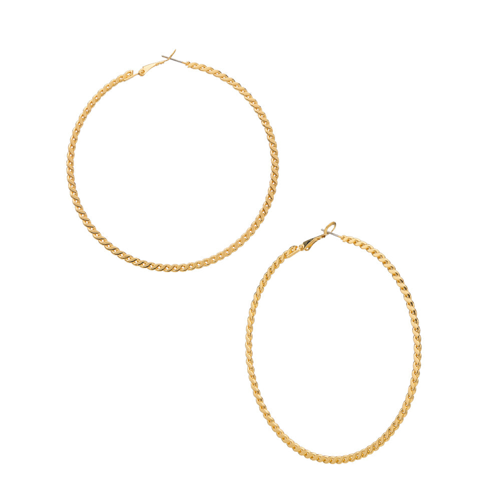 JE719_main "A pair of gold hoop earrings displayed on a white card. The earrings have a twisted design, giving them a textured appearance. The card indicates that the earrings are lead and nickel-free, making them suitable for sensitive skin. The brand na