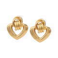 JE723_main "A pair of gold-tone heart-shaped earrings displayed on a white card. The earrings have a layered design, with a larger outer heart shape and a smaller inner heart, both connected by a series of three rings at the top. The card is labeled "arri