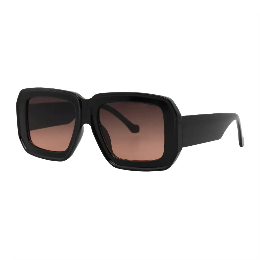 SUN05V5_main "A pair of oversized sunglasses with a bold, geometric design. The frames are black and have a thick, angular shape, giving them a modern and stylish appearance. The lenses are tinted with a gradient that transitions from a darker shade at th
