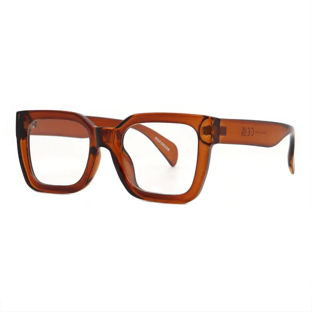 SUN27V5_main "A pair of oversized, square-shaped glasses with a bold, amber-colored frame. The lenses are clear, and the design has a modern, stylish aesthetic. The arms of the glasses are slightly tapered, adding to their contemporary look. Overall, the 