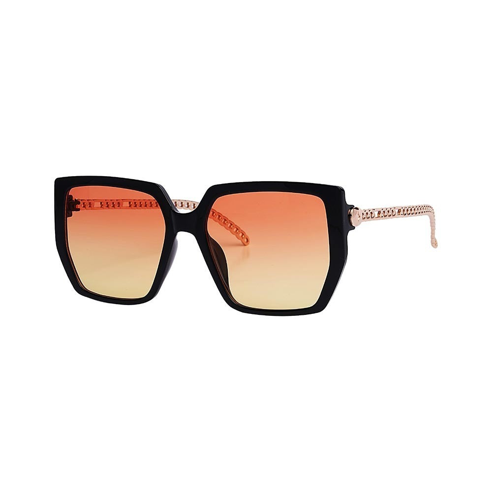 SUN35V2_main "A pair of stylish sunglasses with a bold, square frame design. The front of the frame is black, and the lenses have a gradient tint that transitions from orange at the top to yellow at the bottom. The temples of the sunglasses are adorned wi