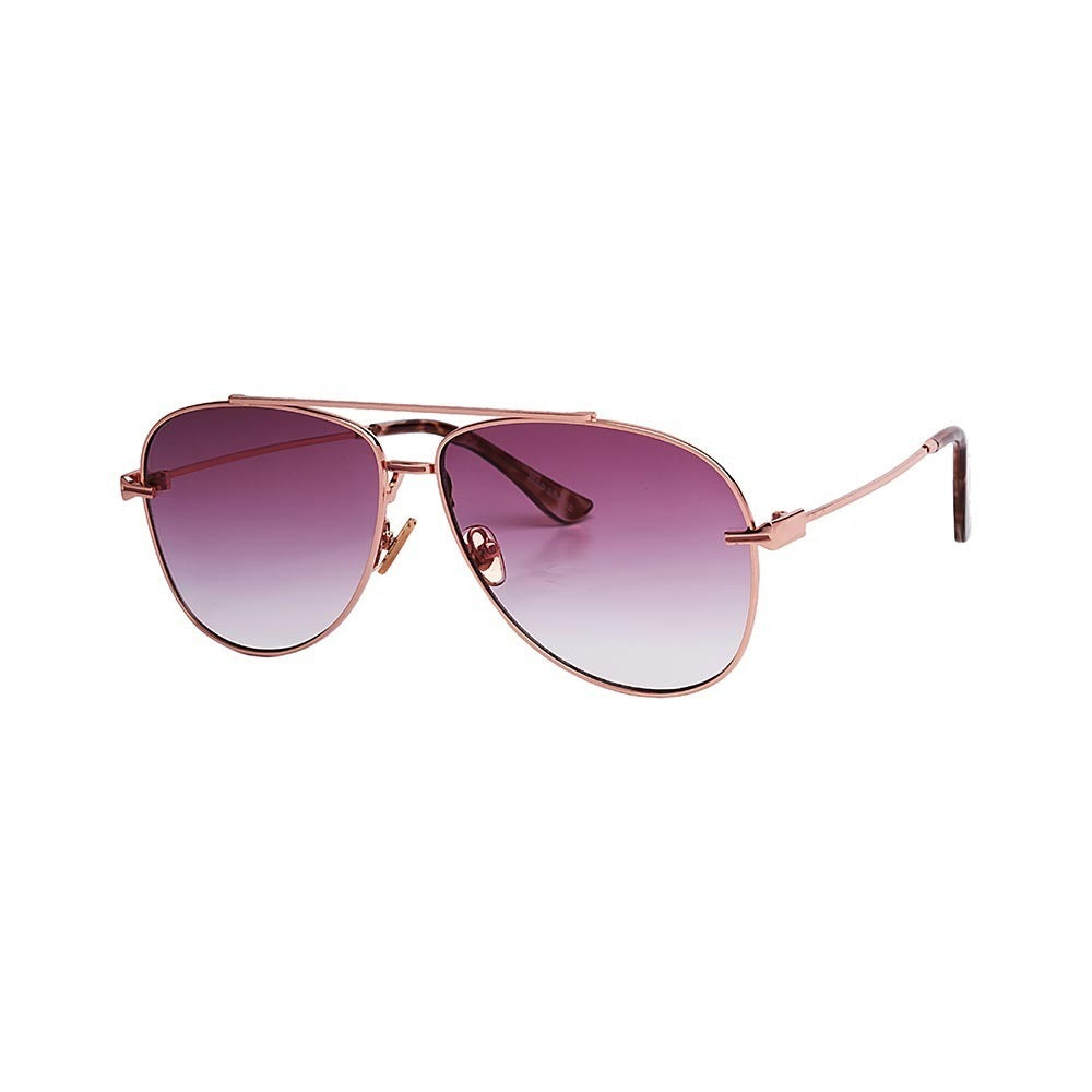 SUN36V2_main "A pair of aviator-style sunglasses. The sunglasses have a thin, metallic frame with a rose gold finish. The lenses are large and have a gradient tint, transitioning from a darker shade at the top to a lighter shade at the bottom. The nose pa