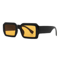 SUN51V5_main "A pair of stylish sunglasses with a bold, geometric design. The frames are black and have a thick, angular shape, giving them a modern and edgy look. The lenses are a vibrant yellow, adding a pop of color and a unique flair to the overall de
