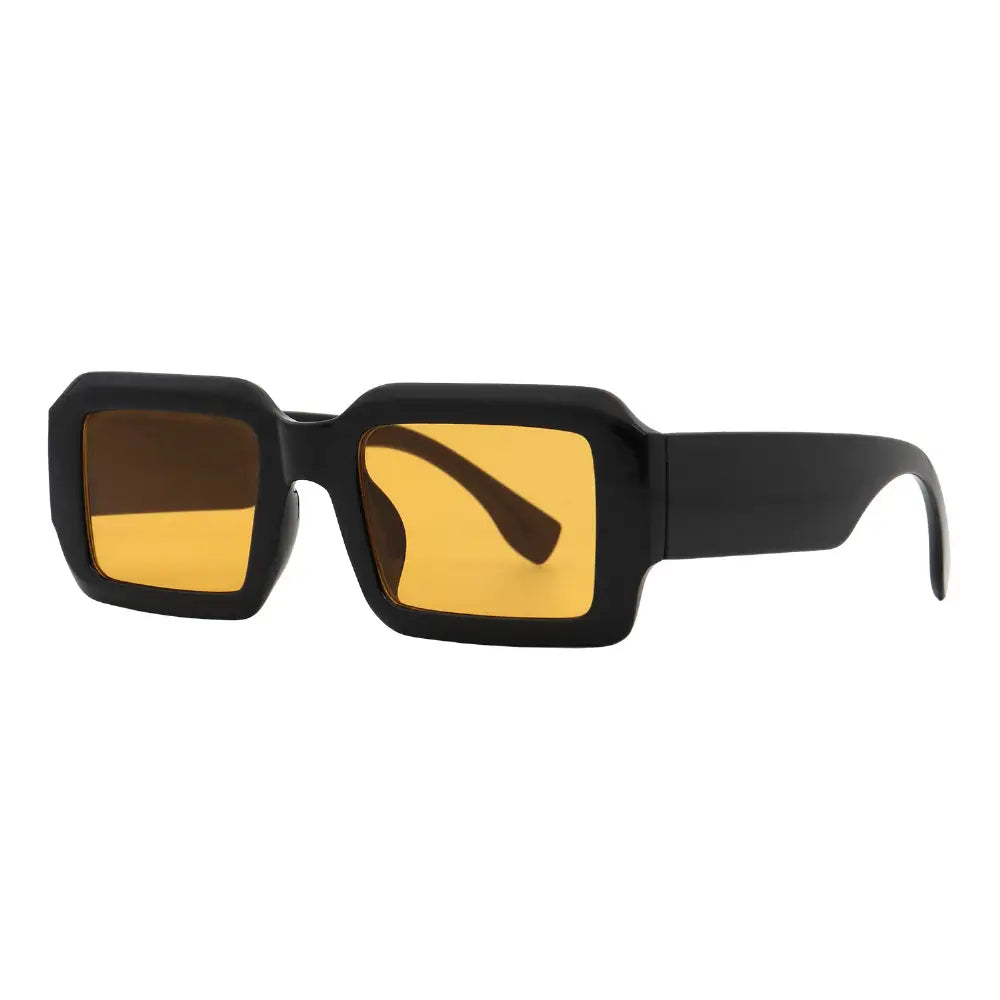 SUN51V5_main "A pair of stylish sunglasses with a bold, geometric design. The frames are black and have a thick, angular shape, giving them a modern and edgy look. The lenses are a vibrant yellow, adding a pop of color and a unique flair to the overall de