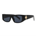 SUN54V5_main "A pair of stylish sunglasses with a sleek, modern design. The frames are predominantly black, with a slightly curved shape that gives them a sporty appearance. The lenses are dark, providing a high level of tint, which suggests they are desi